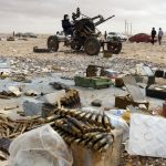A rebel mans an anti-aircraft gun in Ras Lanuf